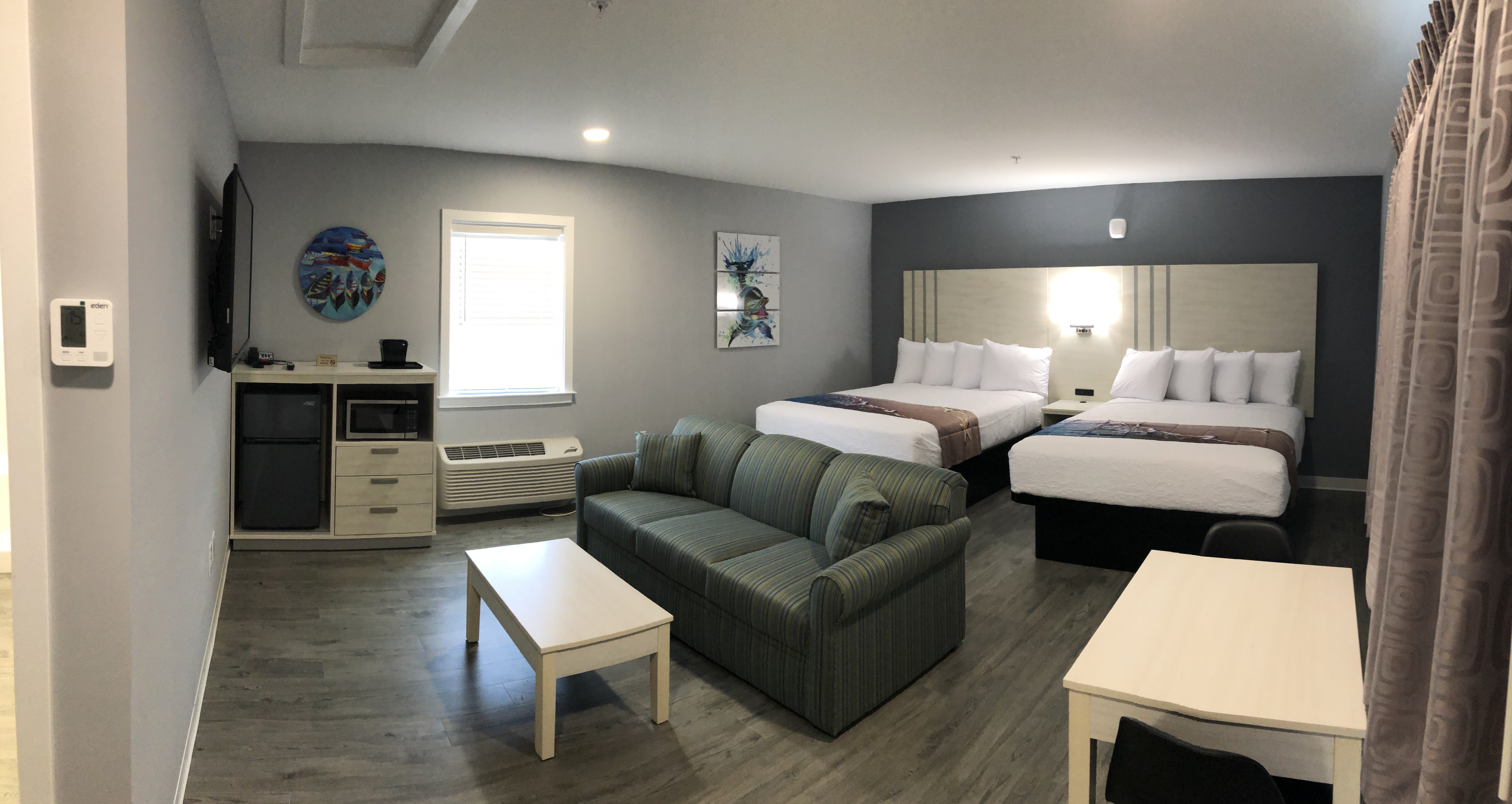 Suite with kitchenette and seating area